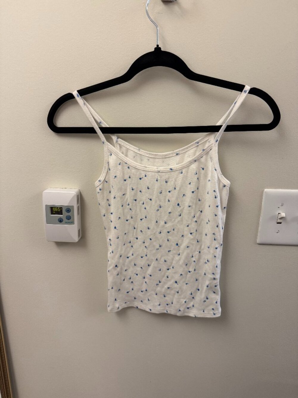 white tank top with small blue flowers